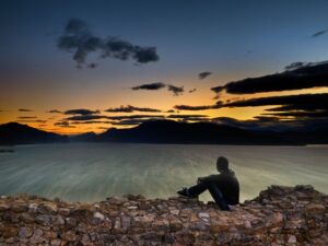 Man thinking how to balancing technology, faith and fulfillment