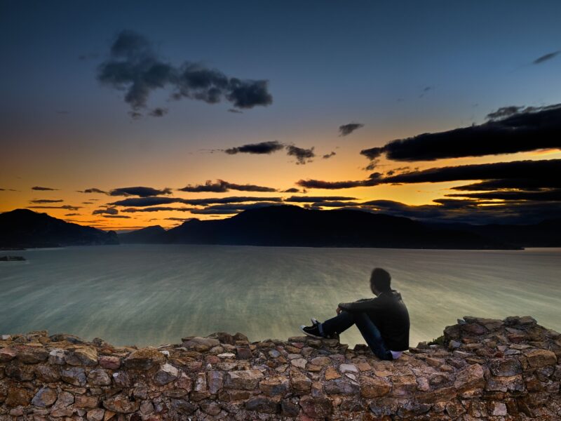 Man thinking how to balancing technology, faith and fulfillment